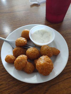 Fried mushrooms with ranch dressing.