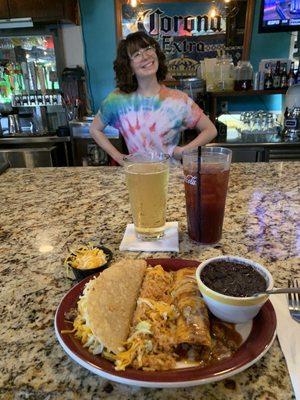 Pick two combination of the crispy beef taco and a beef enchilada with Spanish rice and Oaxacan Black Beans