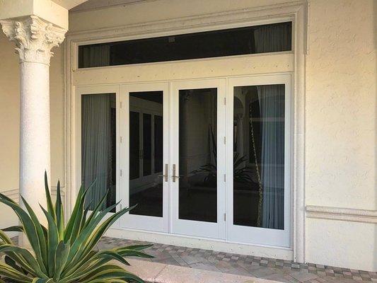 Double French door with two sidelights and a picture window above! (White frames / impact grey glass) #floridaimpactwindowsanddoors