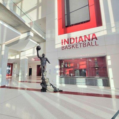 Basketball player statue in front entrance located to the far right