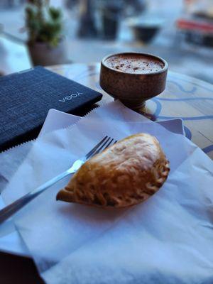 The Cafe Miel is one of the most unique coffee I've had. Love it. That small beef empanada is delightful as well.