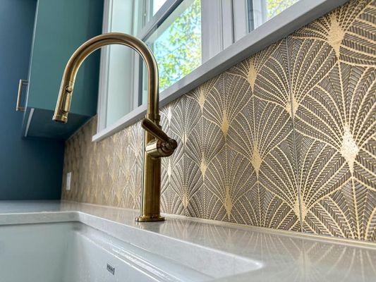 Gorgeous marble tile with gold accents we had the pleasure of installing.