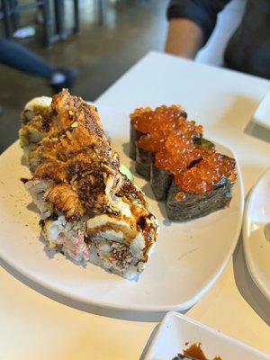 Salmon roe and one of the cooked rolls