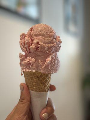 Honest Strawberry single scoop on sugar cone