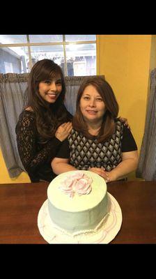 A simple light blue cake with pink flowers for my moms birthday!