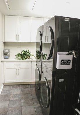 Our laundry room beautifully accommodates all 16 residents.