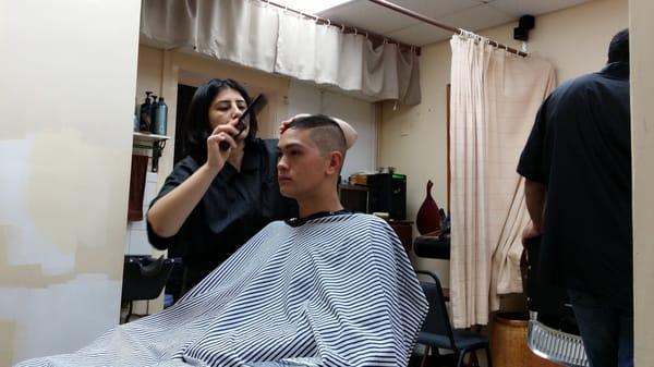 My brother getting a fresh cut.