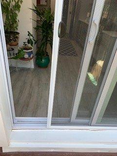 Outside frame cracked caused from water damage from outside patio door