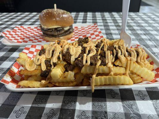 Mushroom burger with extra patty and loaded Nashville beef fries.