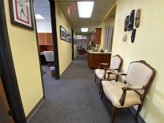 Hallway to Chiropractic treatment rooms, therapy room and rehab room