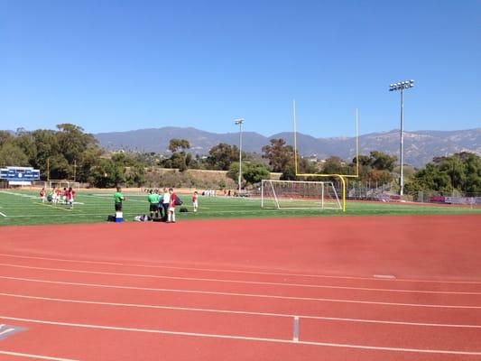 Nice field surround by mountains and the ocean