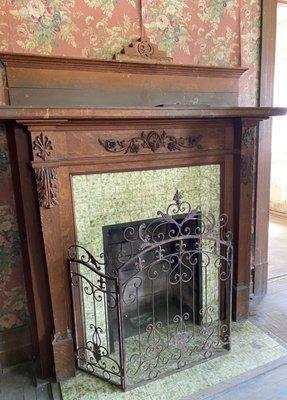 Original tile work around fireplace in Currier House