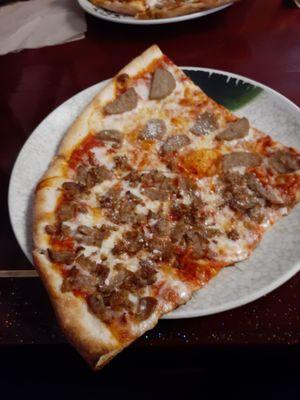 Lunch special 2 slices with meatballs and sausage.