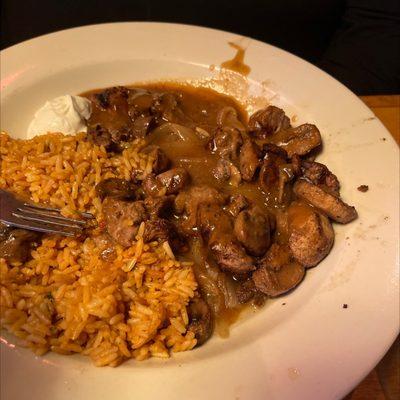 Beef rib tips over rice