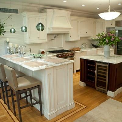 Spacious kitchen with custom marble and woodwork