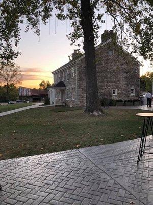 Stone House with old barn in the background