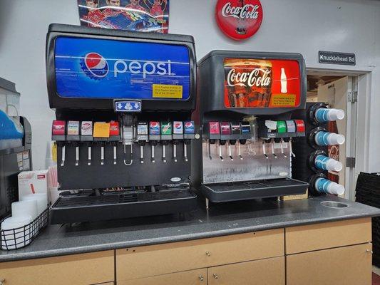 Pepsi/Coke...they even have red cream soda!