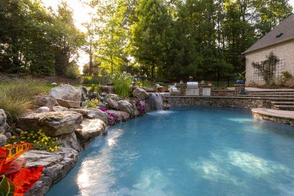 Custom Pool in natural setting with real rock work to include waterfall and grotto