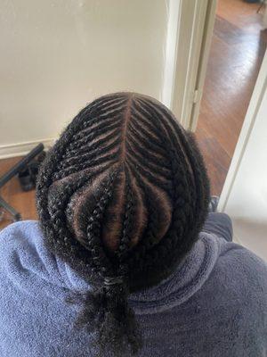 Fishbone braids in man bun