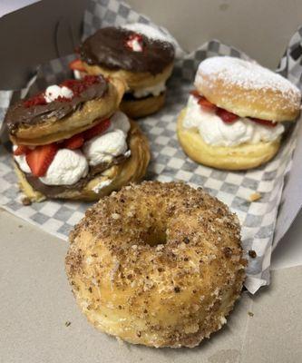 3 Specialty donuts with a regular in front