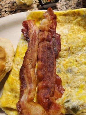 Side of too crunchy bacon