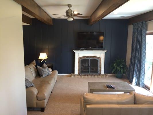 Entire room was painted including the faux painted beams. They also painted our mantle in Benjamin Moore Simply White.