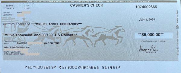 A copy of the cashier's cheque paid to the owner, Miguel Angel Hernandez. Soon after cashing it, he instructed his workers to cease work.