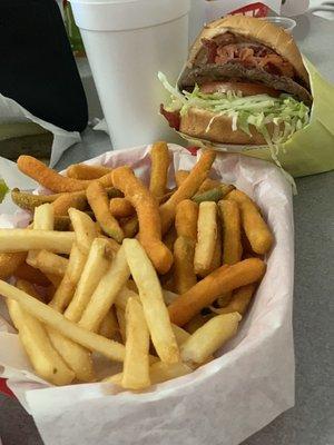 Pastrami cheeseburger with fries and zucchini