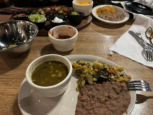 Yes ladies and gents, they called this flavorless soup chile verde. Fajitas in the back. Bland and pricey.