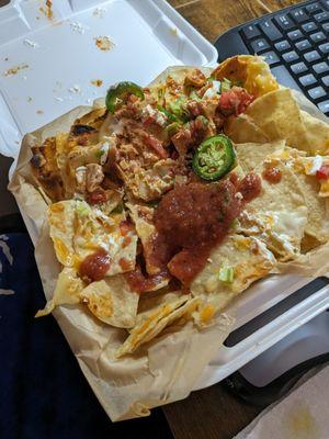 Nachos with chicken. Look hard for the Chicken.