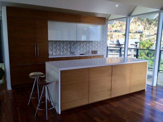 This is the kitchen with the island's sliding top closed. The island was designed to look like a credenza with the top closed.