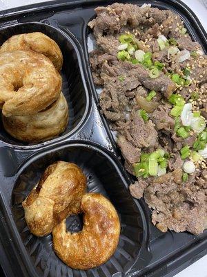 Bulgogi over rice with fried dumplings