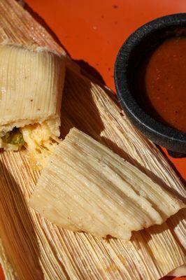 Cheese & rajas corn husk tamal, made with gluten & GMO-free masa. Order in person or for catering. They sell out fast!