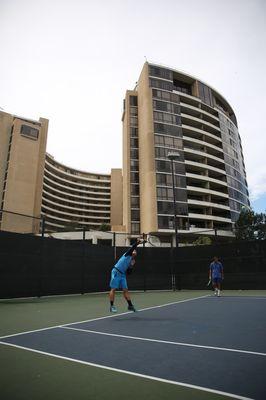 Gene serving on court #1