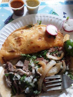 Best tripa taco in town!   Lengua and quesibirria in picture also