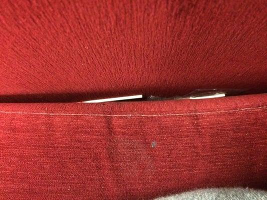 These are lollipop sticks in between the cracks of a couch. Gross!!!!!