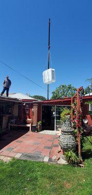 We used crane service to get Jacuzzi over to back yard .installers jumped right in and took care of it