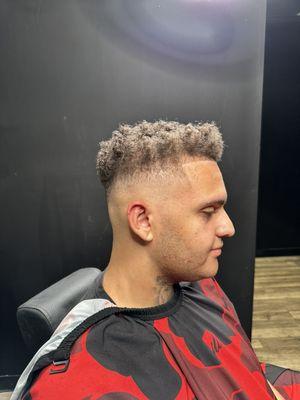 Mid Fade Sponged Top. Crispy Lone Up w/ enhancements.