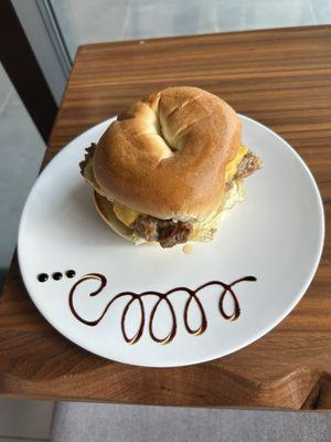 Sausage egg and cheese on a plain bagel