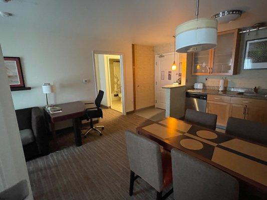 Kitchen and living room areas.