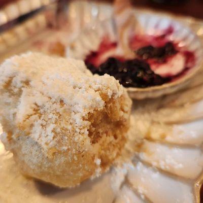 Tempura battered cream puffs with berry compote