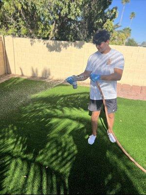 Sanitizing the yard after a clean up!