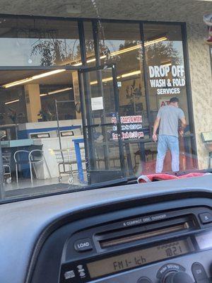 On the window it shows clearly what time the business closes.. And that's the rude guy who works here with his illegal gambling.