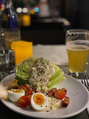 The Wedge Salad - AMAZING. Perfect balance of flavors. The chunky bacon, and boiled egg were cooked to perfection.