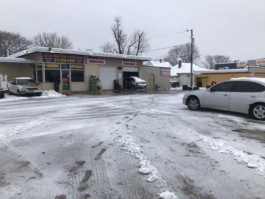 Got the lot plowed for our customers. Car in garage for a radiator replacement. Kirk's Used Tires & Quick Lube