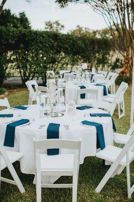 Tables set outside on a wonderful day at Diamond Oaks