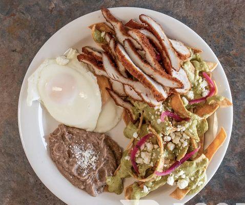 Creamy poblano chilaquiles with milanesa