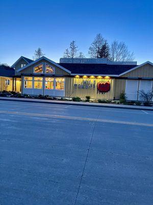 Wild Tomato exterior at night.