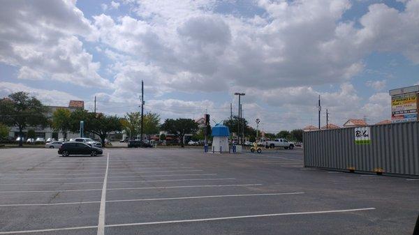 Watermill vending machine is in the middle of the parking lot