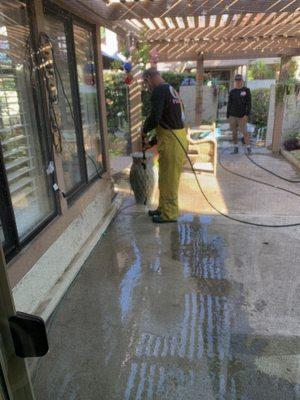 Tom Davis window cleaning... Working in my back patio.